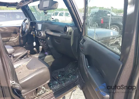 2016 Jeep Wrangler Unlimited Freedom from USA, damaged, VIN 1C4BJWDG9GL211030